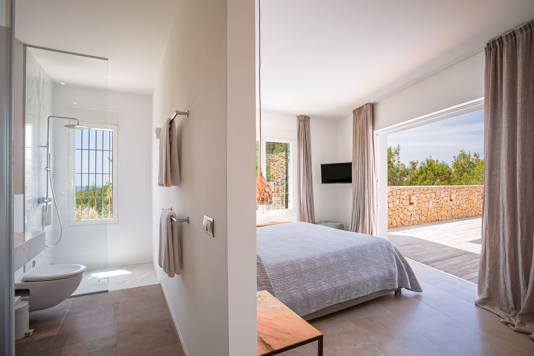 Bedroom 5 accessed via the main house, with direct access to the pool