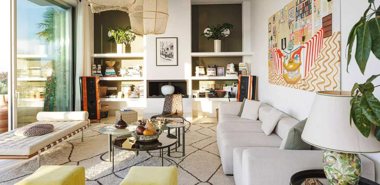 living room in crete villa with lots of natural night and decor