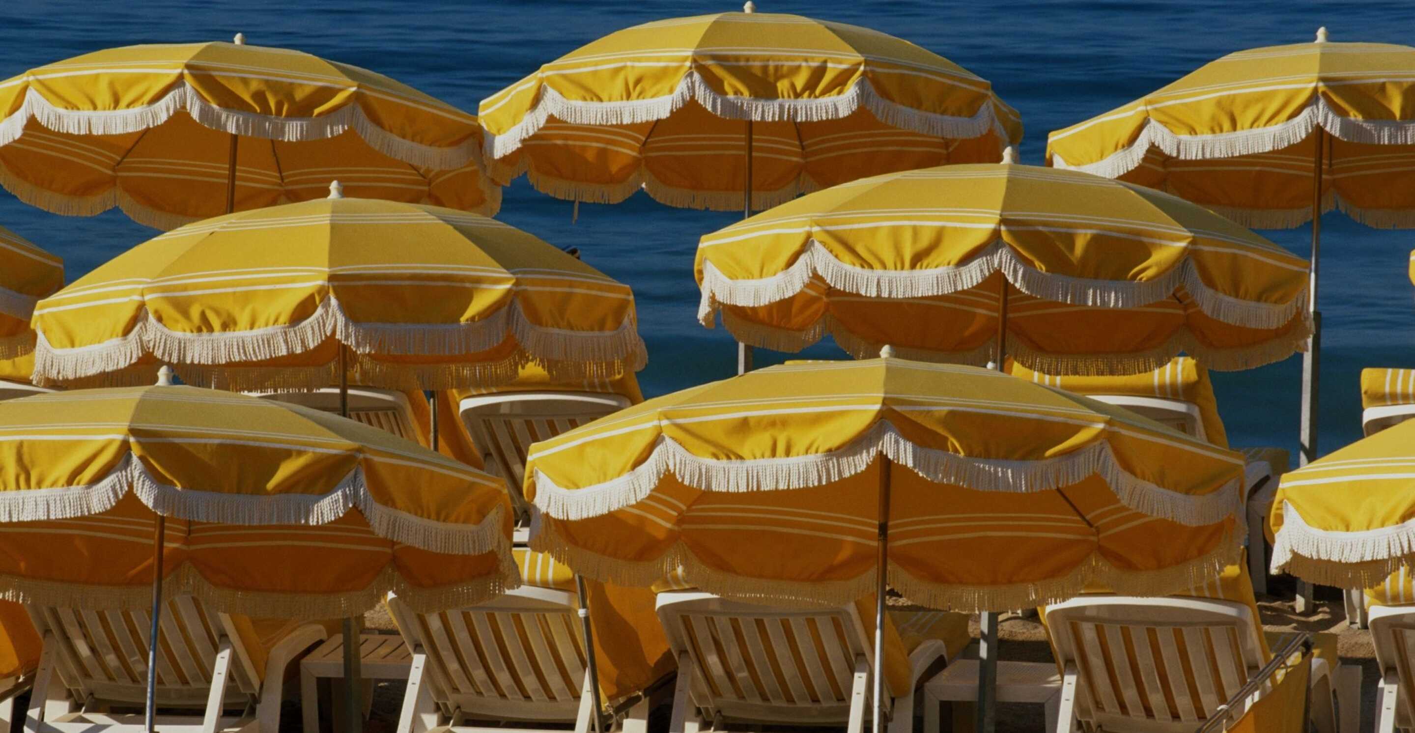 Two-lounge-chairs-with-the-rolling-green-hills-in-the-background
