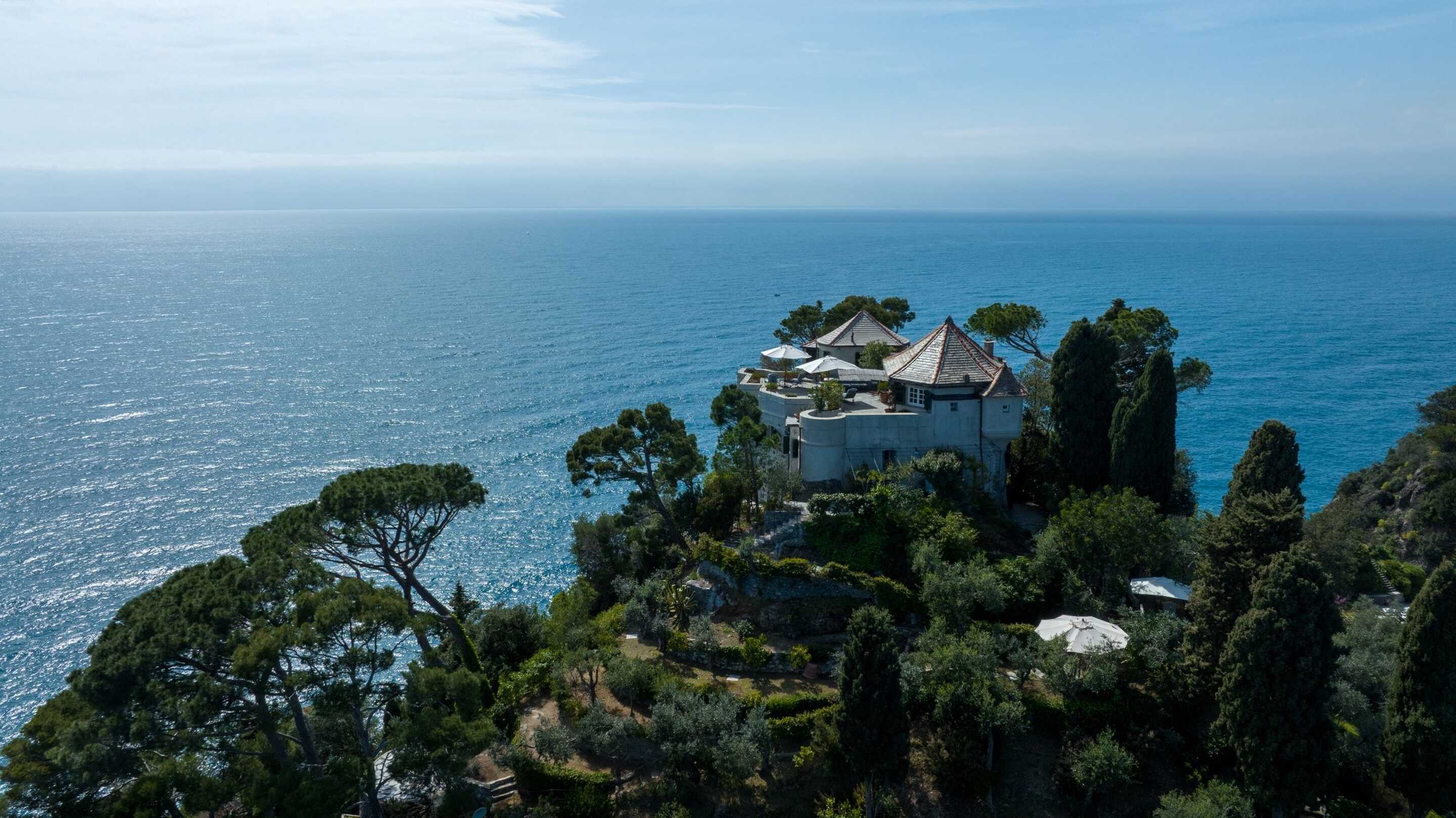 beautiful house on the top of a hill in front of the mediterranean sea 