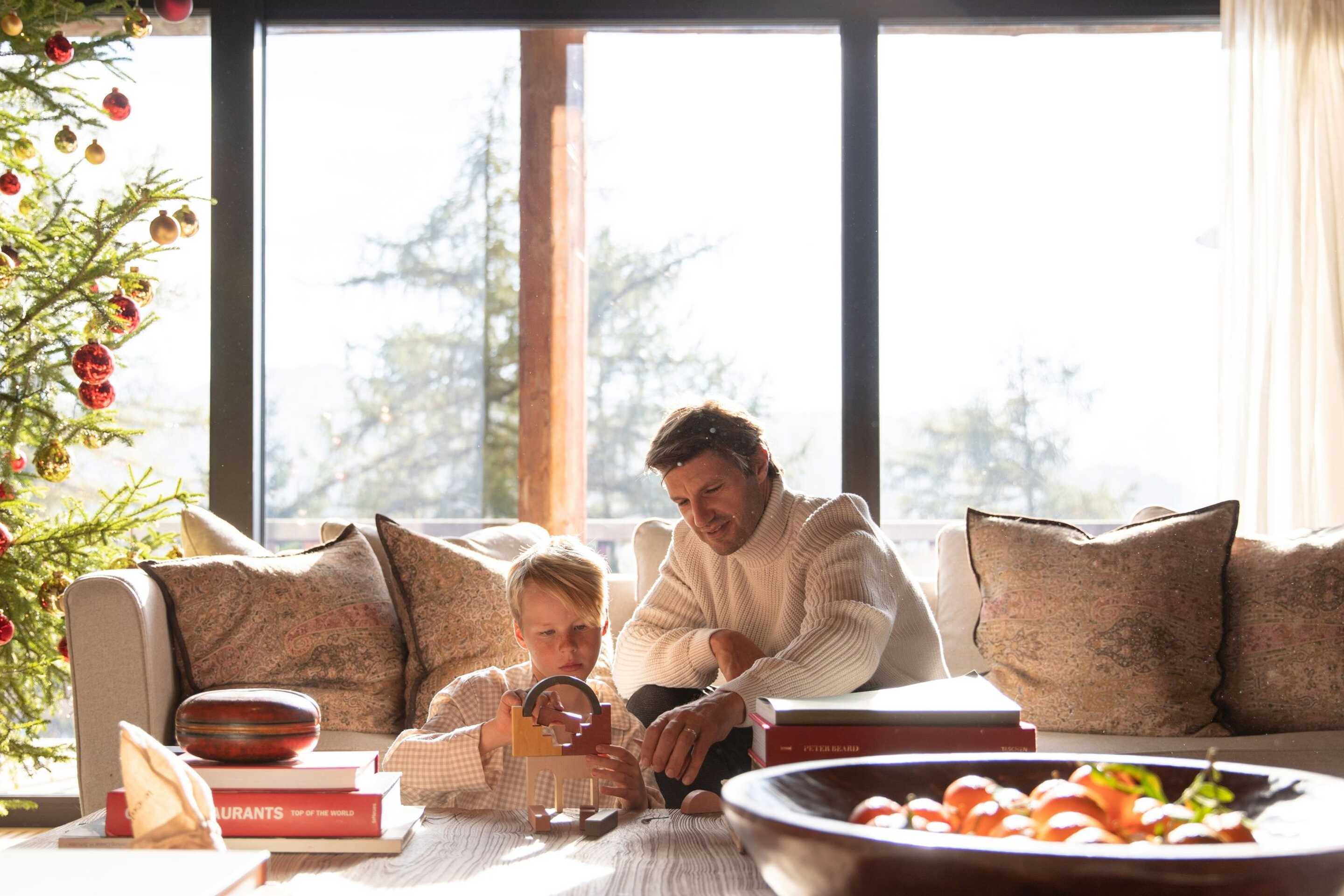 Father and son in luxury chalet