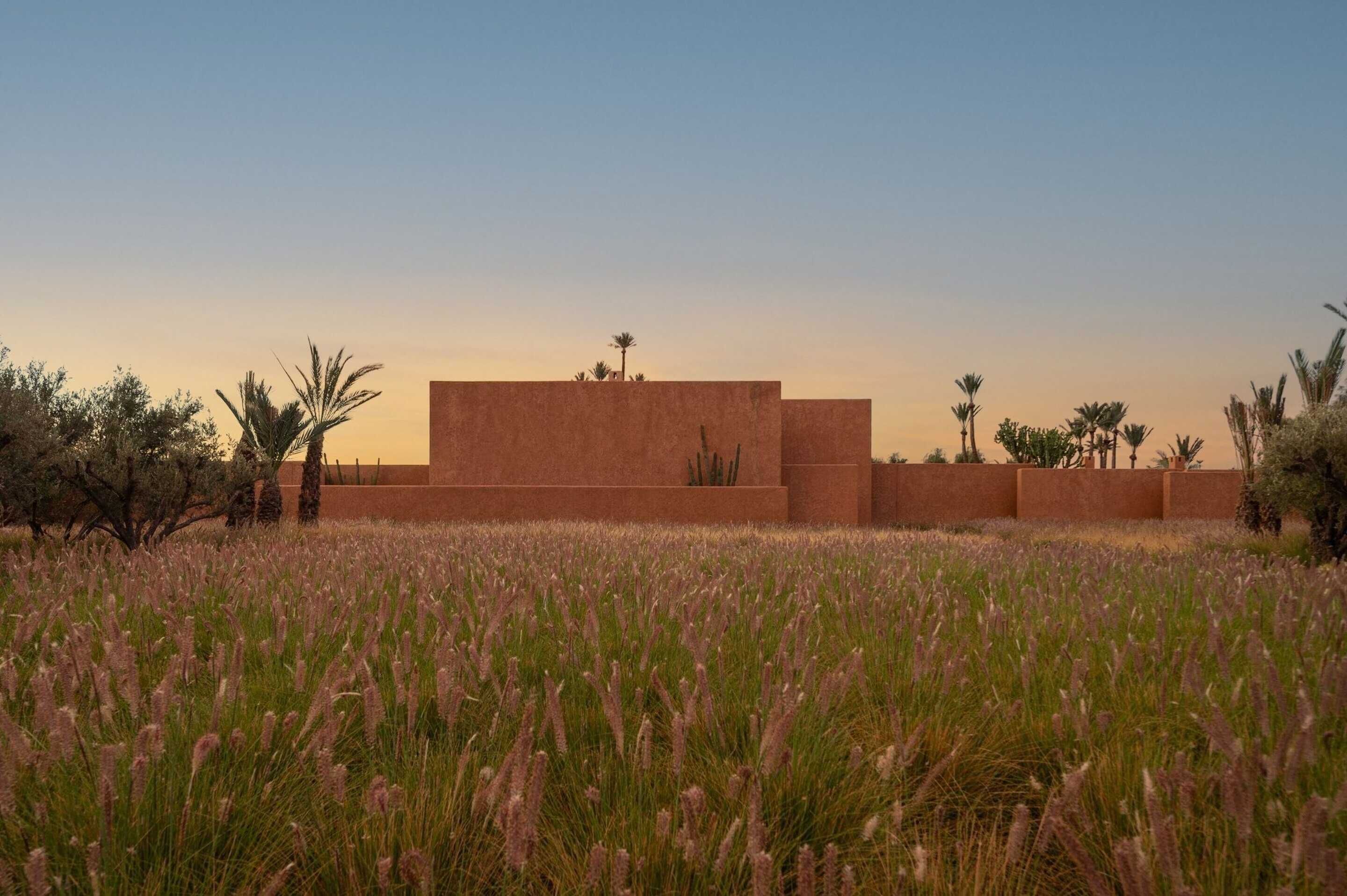 large-holiday-home-with-dusty-rose-walls-in-a-field