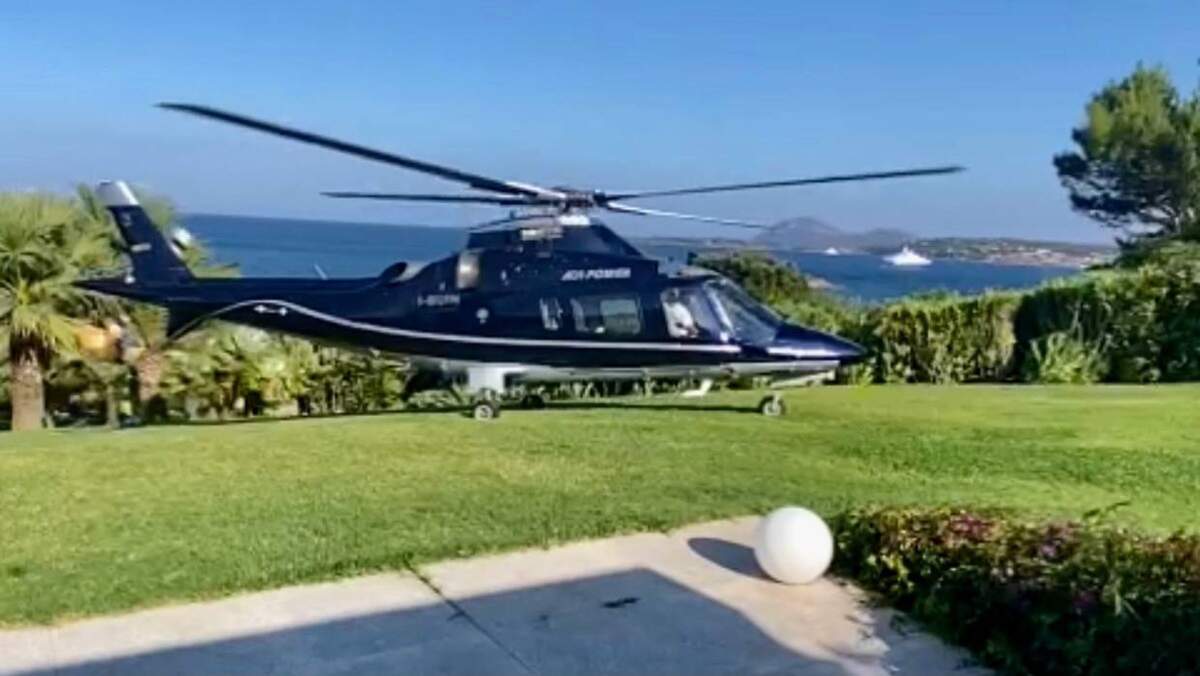 7677