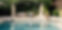 Family-relaxed-around-a-swimming-pool-of-a-luxury-villa-rental-in-Provence