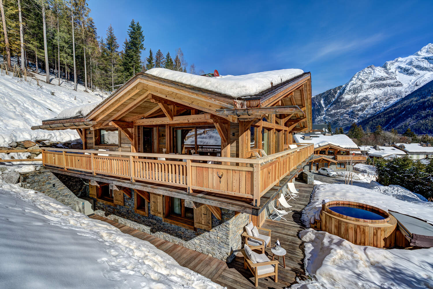 A Chamonix chalet in winter with steam from the roof